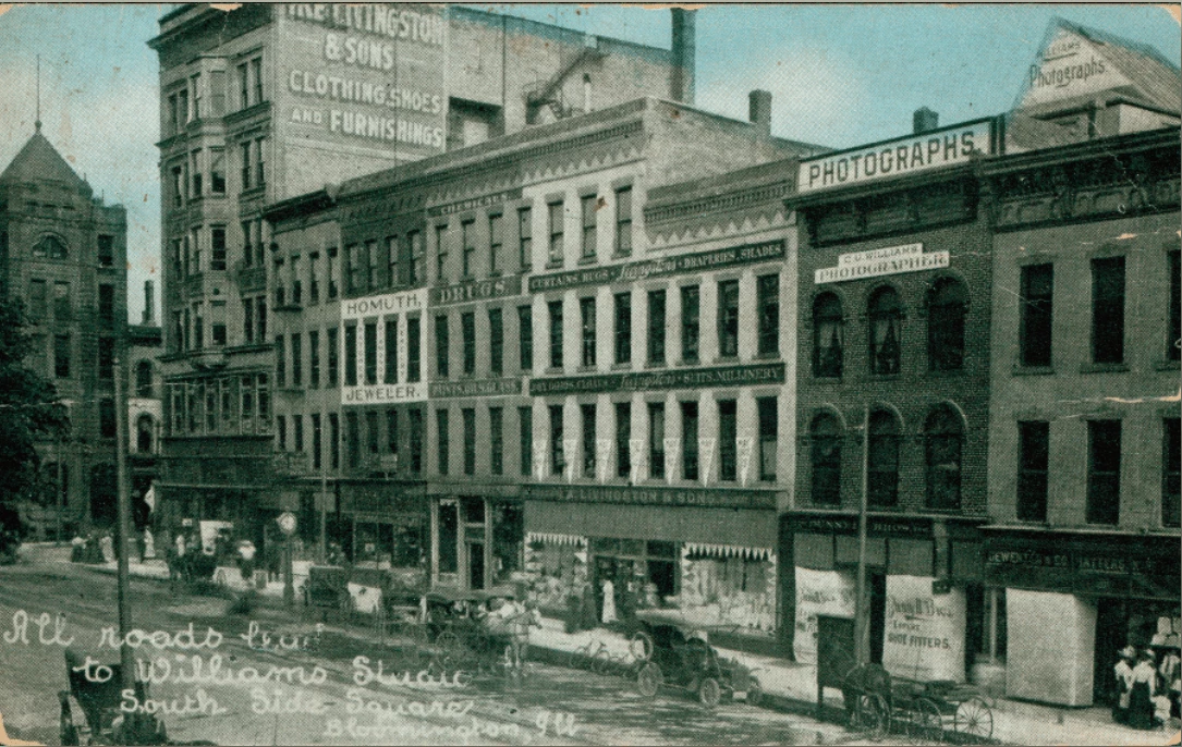 Post card showing an entire block of buildings on Washington St.