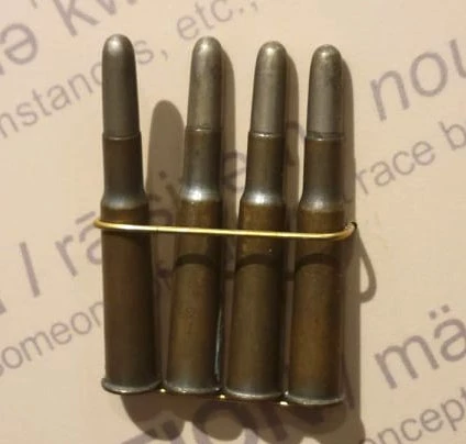 4 metal bullet cartridges