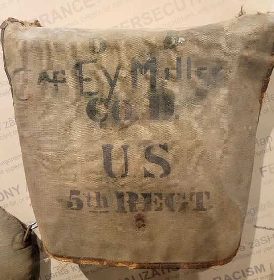 Canvas bag with Ey Miller Co. D. U.S. 5th REGT printed on it.