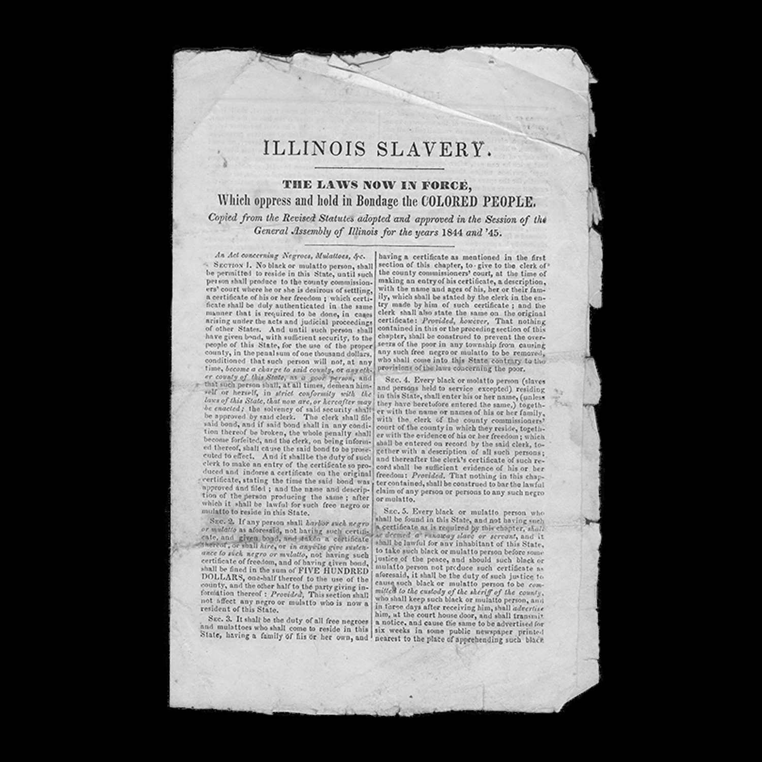 Photograph of legal document with torn edges. It reads “Illinois Slavery. The laws now in force, which oppress and hold in Bondage the Colored People. Copied from the Revised Statues adopted and approved in the Session of the General Assembly of Illinois for the years 1844 and ’45.’