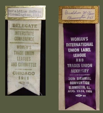 Both ribbons have name plates at the top. One is white, one is a deep purple.
