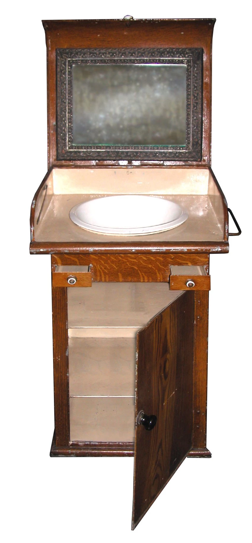 Photo of a bathroom vanity made of tin, but painted to look like wood.
