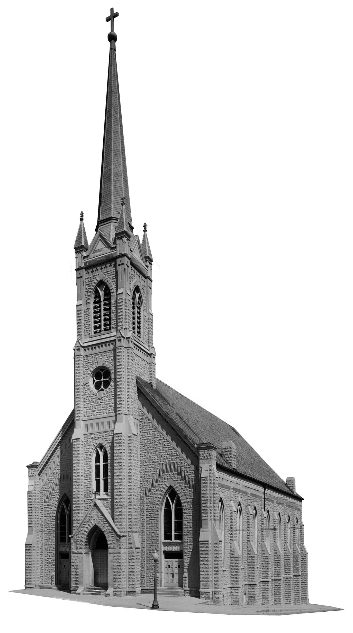 Black and white photo of a brick church with a very tall steeple.