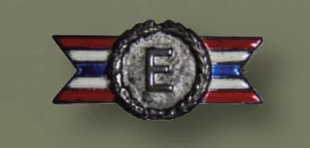 small pin, with an E in the center of a wreath design, and red white and blue strips on either side.